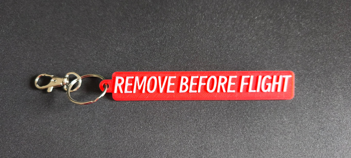 Remove Before Flight Keychain